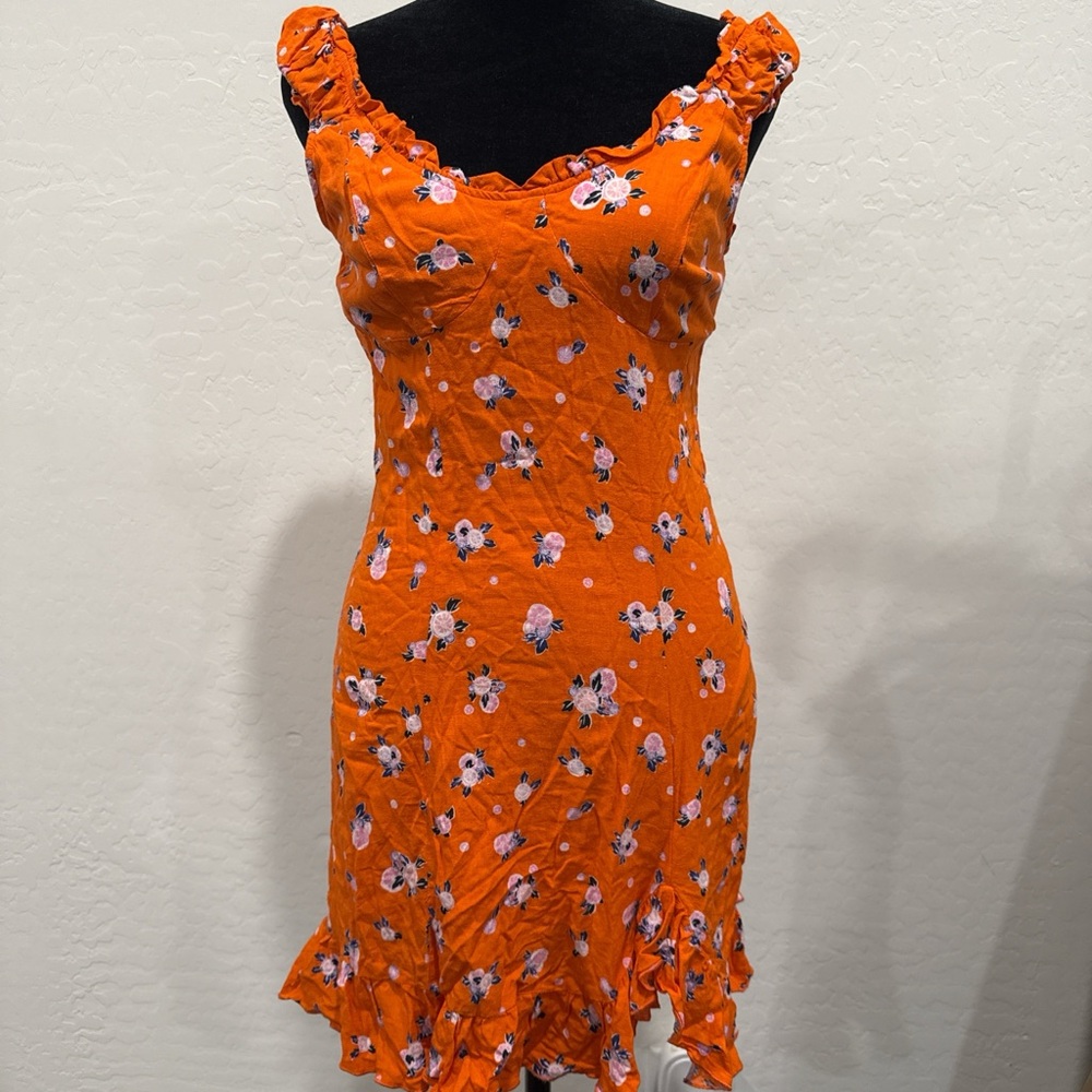Free People Like a Lady orange floral mini dress with a ruffled hem size xs